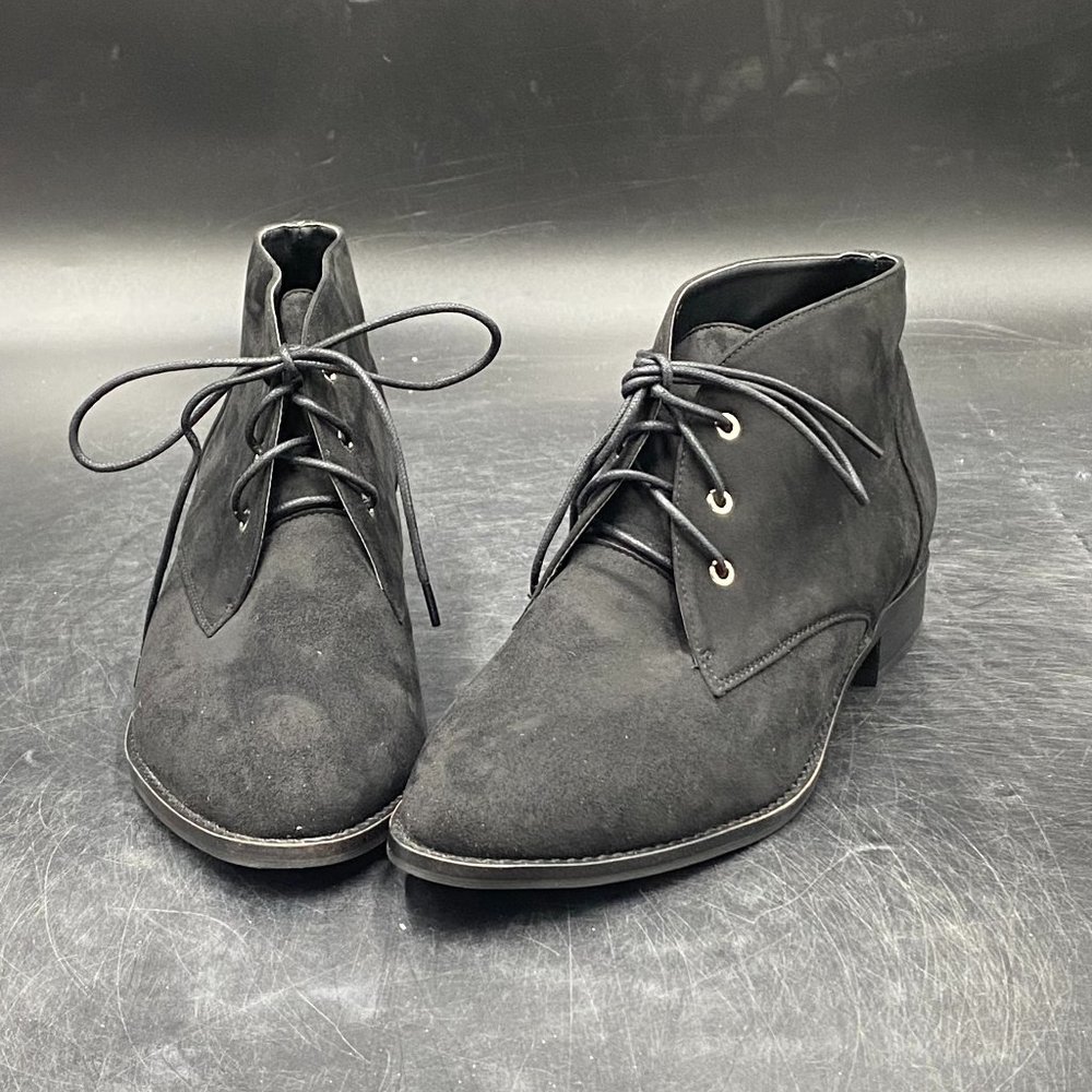 Black Pointed Toe Low Heel Lace Up Ankle Boot. New in box. Never used.